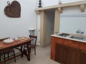 Kuchyň nebo kuchyňský kout v ubytování Dimora '400
