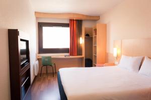 Postel nebo postele na pokoji v ubytování ibis Grenoble Gare