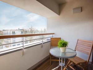 Balkón alebo terasa v ubytovaní VacationClub - Sand Hotel Apartment 308