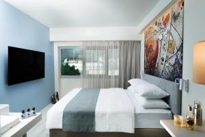 Letto o letti in una camera di Link Hotel & Hub By Dan Hotels
