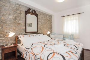 Postel nebo postele na pokoji v ubytování Villa Cetina - Apartment with a view