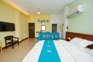 Vuode tai vuoteita majoituspaikassa 永旺旅店 Yong Wong Hostel