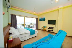 TV tai viihdekeskus majoituspaikassa 永旺旅店 Yong Wong Hostel