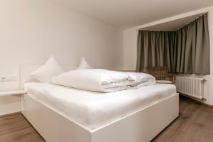 A bed or beds in a room at Villa Blau