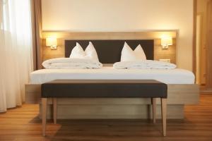 Postel nebo postele na pokoji v ubytování Flair Hotel Grüner Baum