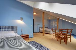 Postel nebo postele na pokoji v ubytování Aerohotel + 36 fotografií