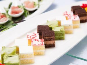 a white plate with several different types of desserts at Izu Nagaoka Kinjokan in Izunokuni