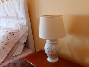Postel nebo postele na pokoji v ubytování Sa Chessa B&B
