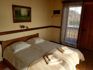 Postel nebo postele na pokoji v ubytování Guest House and camping Jurmala