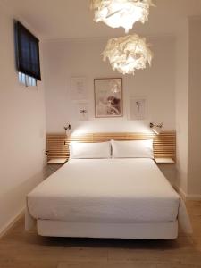Posteľ alebo postele v izbe v ubytovaní Las Atarazanas - Design Hostal