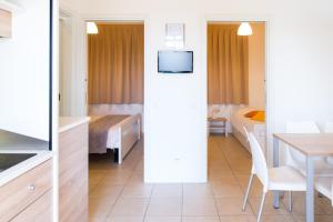 TV a/nebo společenská místnost v ubytování Agriturismo Alba