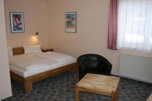 Postel nebo postele na pokoji v ubytování Seminarhotel Jakobsberg + 37 fotografií