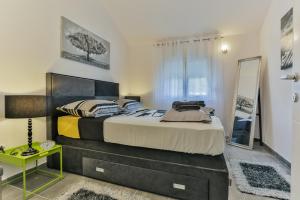 Posteľ alebo postele v izbe v ubytovaní Villa Scandalli