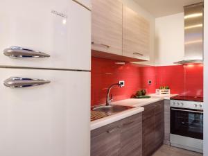Kuchyň nebo kuchyňský kout v ubytování Savvas Luxury Suites