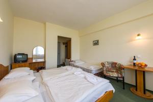 Posteľ alebo postele v izbe v ubytovaní Hotel Nostra