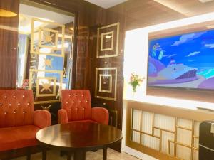 TV a/nebo společenská místnost v ubytování ARINÇ HOTEL