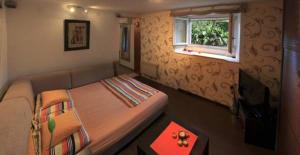 En eller flere senger på et rom på Adriatic Apartments