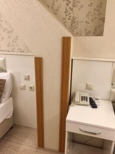 Postel nebo postele na pokoji v ubytování ARINÇ HOTEL