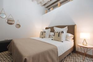Postel nebo postele na pokoji v ubytování Hommyhome Casa Assle