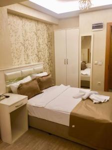 Postel nebo postele na pokoji v ubytování ARINÇ HOTEL