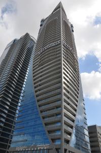 two tall buildings are next to each other at City Premiere Hotel Apartments - Dubai in Dubai