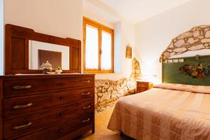 Ένα ή περισσότερα κρεβάτια σε δωμάτιο στο Agriturismo Lillastro