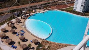 Bazén v ubytování Laguna Bahía, Algarrobo nebo v jeho okolí + 3 fotografie