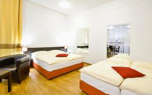 Posteľ alebo postele v izbe v ubytovaní Apartments Central Park Marienbad