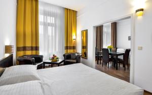 Posteľ alebo postele v izbe v ubytovaní Apartments Central Park Marienbad