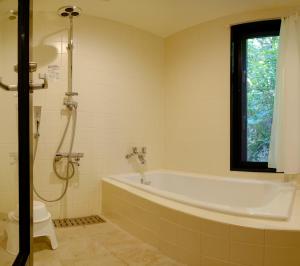 Koupelna v ubytování Villa SACHIIBARU 浜辺の茶屋 の 宿