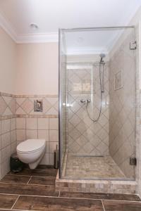 Phòng tắm tại Pensiunea Dimitrios