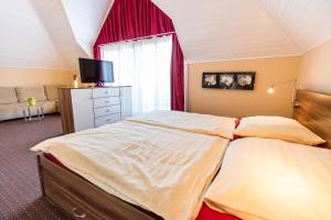 Posteľ alebo postele v izbe v ubytovaní Haus Sonnenhof