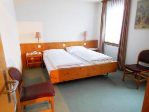 Postel nebo postele na pokoji v ubytování Hotel Aeschipark