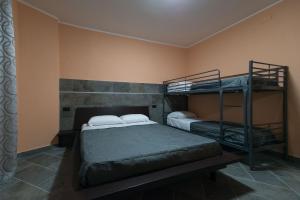 Postel nebo postele na pokoji v ubytování B&B Mazzini