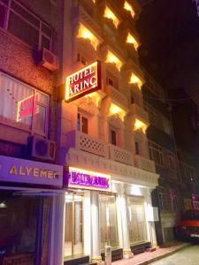 a building with a hotel king sign on it at night at ARINÇ HOTEL in Istanbul