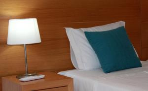 Tempat tidur dalam kamar di Casa Praia Mar