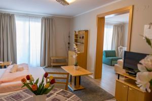 Ein Bett oder Betten in einem Zimmer der Unterkunft Exclusive Holiday Apartments