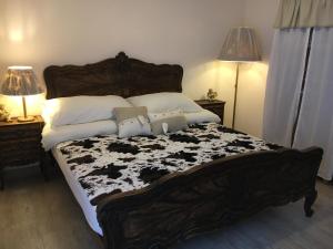 Uma cama ou camas num quarto em B&B Friedau