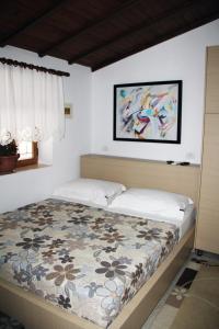 Postel nebo postele na pokoji v ubytování Hotel Boutique Osumi