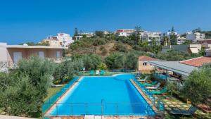 an overhead view of a swimming pool in a resort at Elea in Kato Daratso