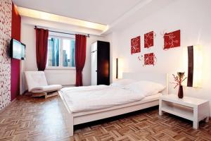 Ένα ή περισσότερα κρεβάτια σε δωμάτιο στο Five Elements Hostel and Capsules Frankfurt