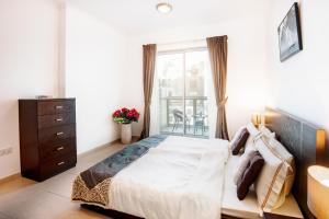 Lova arba lovos apgyvendinimo įstaigoje One Bedroom Apartment Dubai Fountain & Old Town View by Auberge