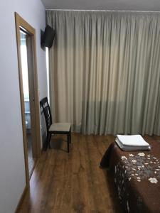 Postel nebo postele na pokoji v ubytování Hostal Juli