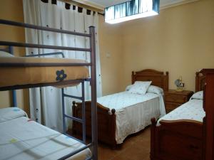 Postel nebo postele na pokoji v ubytování Escapada Delux + 37 fotografií