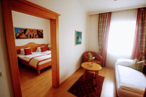 Postelja oz. postelje v sobi nastanitve Hotel Rösch