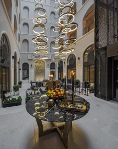 a lobby with a table with fruit on it at 10 Karakoy in Istanbul