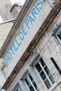 a sign on the side of a building at Hôtel de Paris in Besançon +82 photos