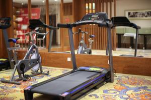 a group of three exercise bikes in a gym at SSAW Boutique Hotel Hangzhou Qiandao Lake in Chun'an