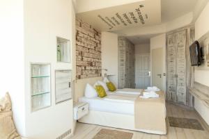 Postel nebo postele na pokoji v ubytování SEETELHOTEL Strandhotel Atlantic das Boutiquehotel am Meer