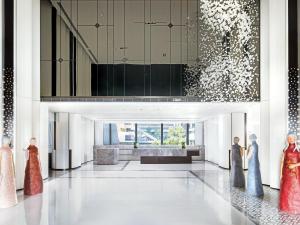 a rendering of a lobby with figurines of women in gowns at Cordis Shanghai Hongqiao (Langham Hospitality Group) in Shanghai